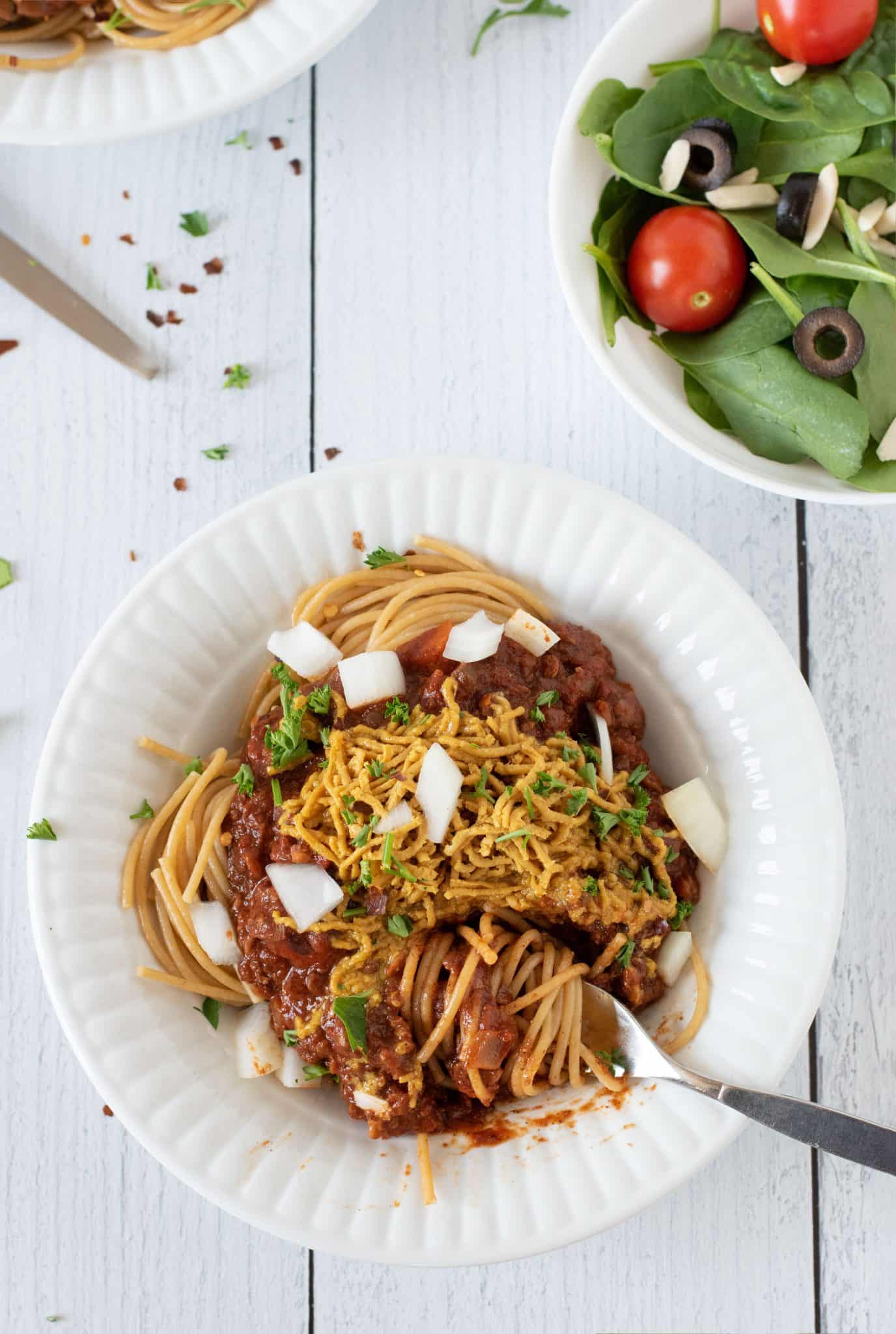 Cincinnati Chili twirled around a fork