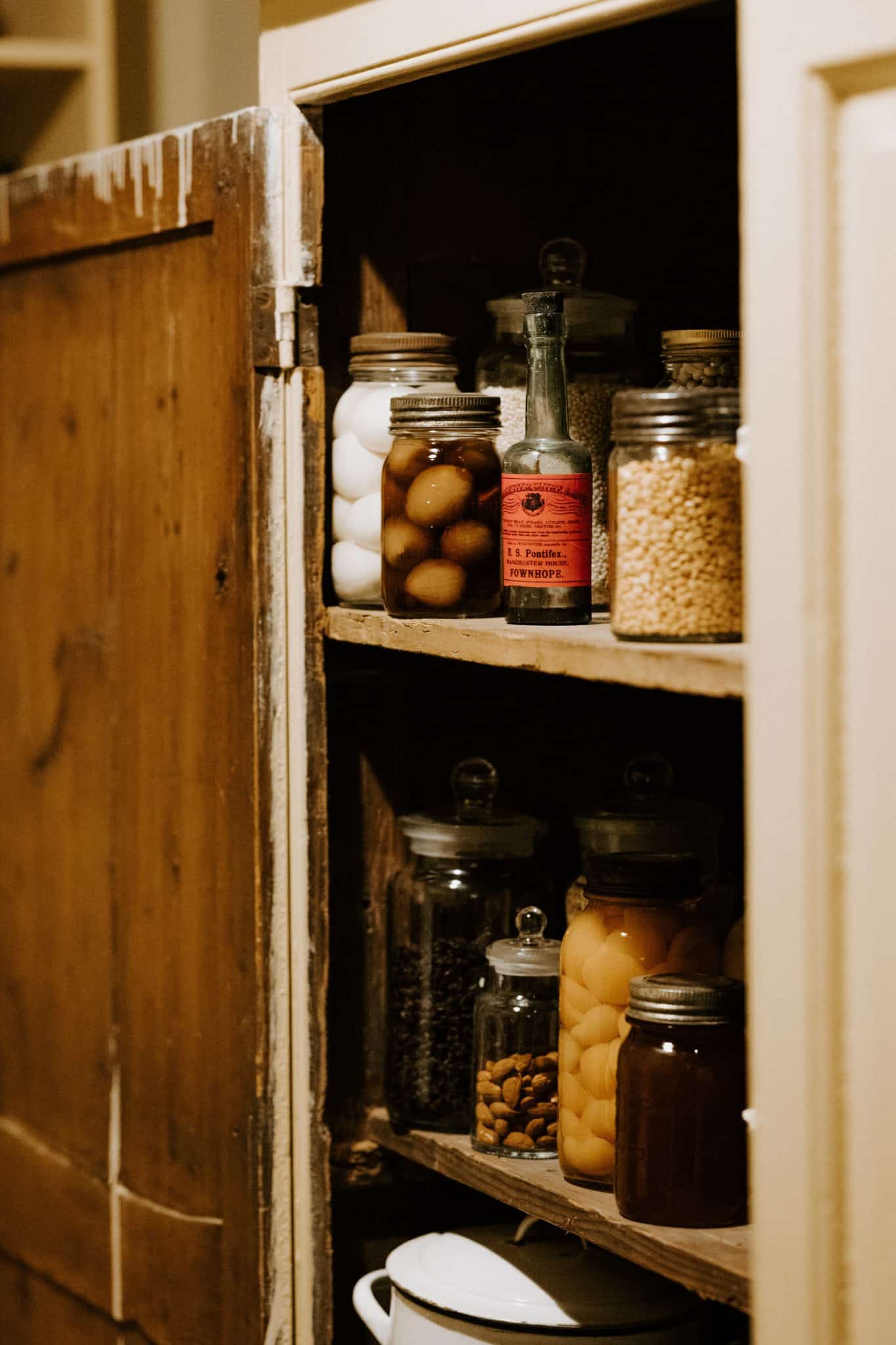 Inside of a pantry with jars of food