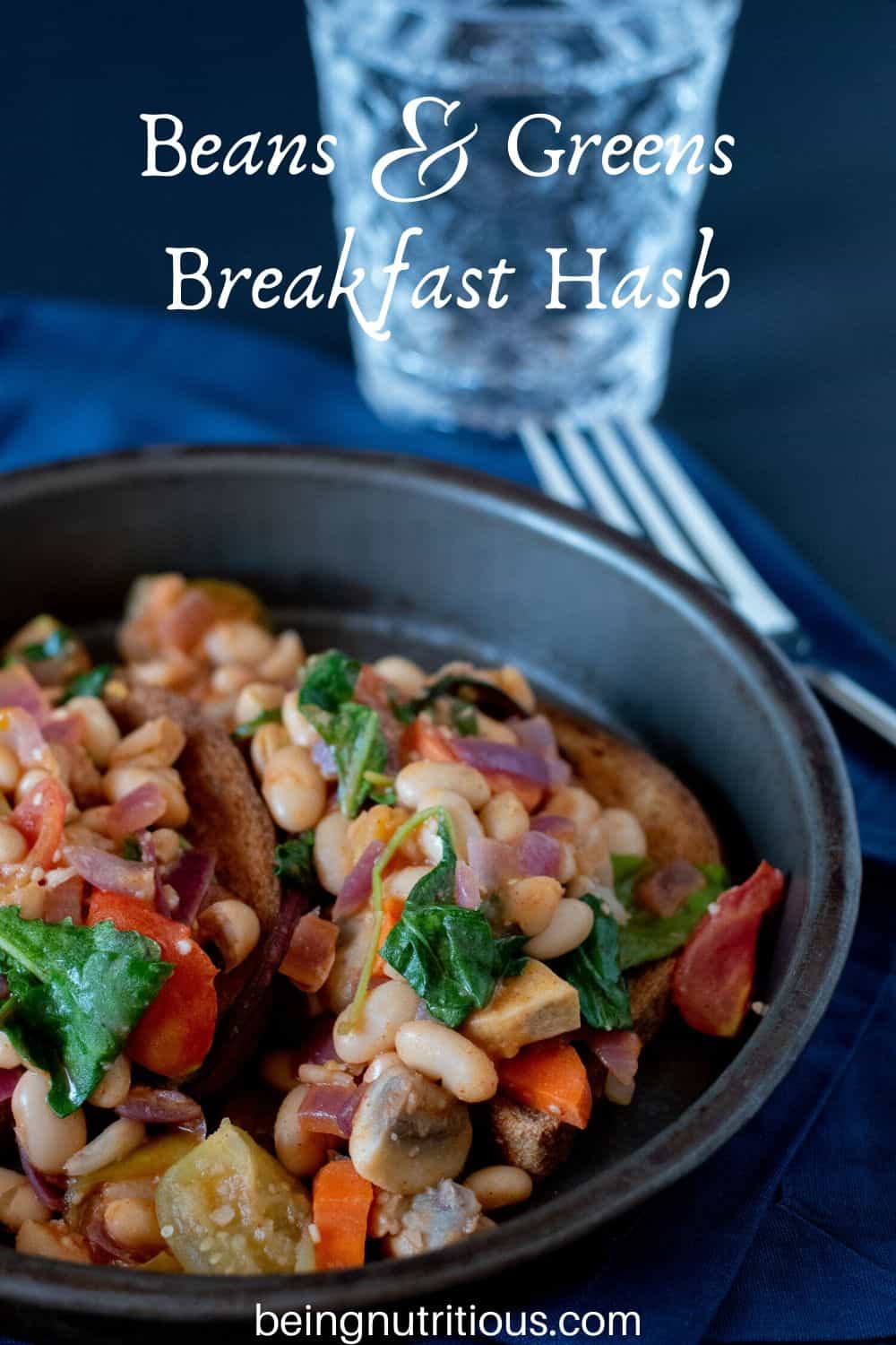 Beans and Greens Breakfast Hash on toast on a metal dish.