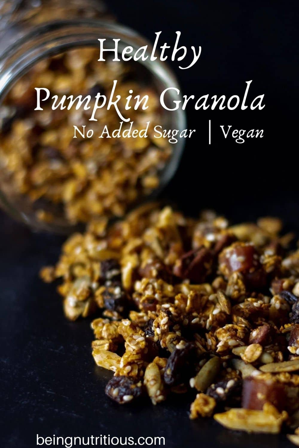 Granola spilling out of a Mason jar on a black background with text overlay: Heart Healthy Pumpkin Granola, no added sugar, vegan.