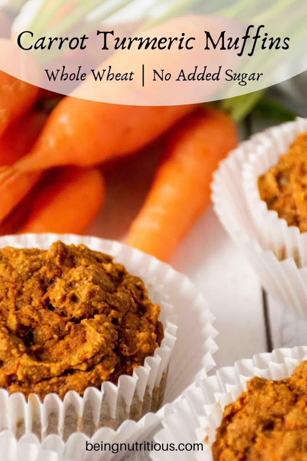 Muffins on a table with fresh carrots in the background. Text overlay: Carrot Turmeric Muffins; whole wheat, no added sugar.