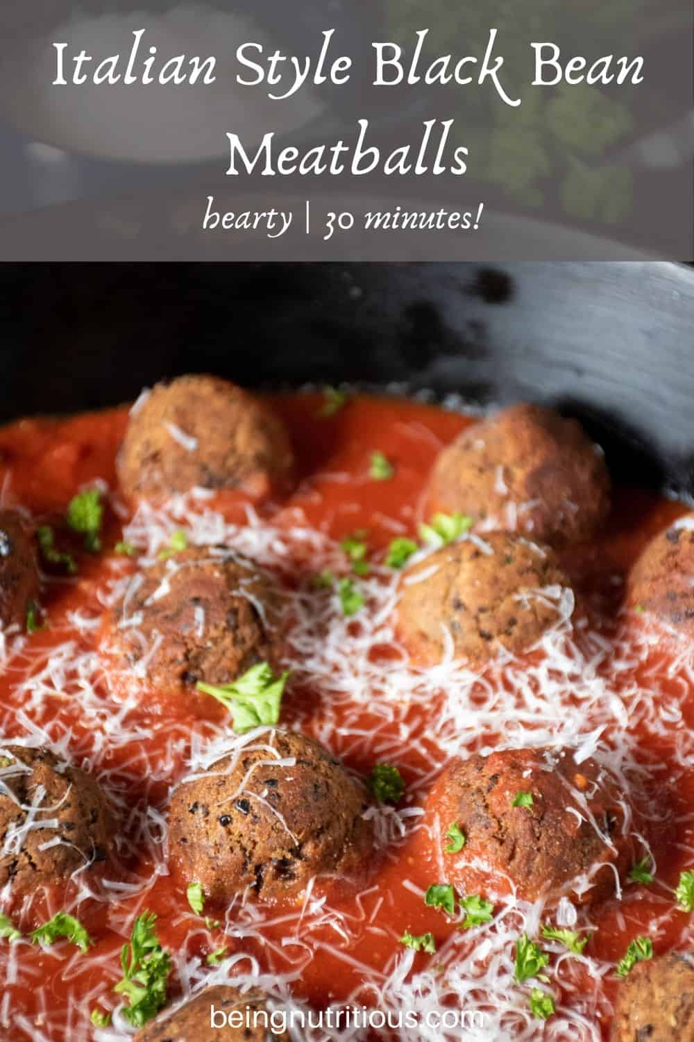 Skillet with meatballs made of black beans with marinara sauce. Text overlay: Italian Style Black Bean Meatballs; hearty, 30 minutes!