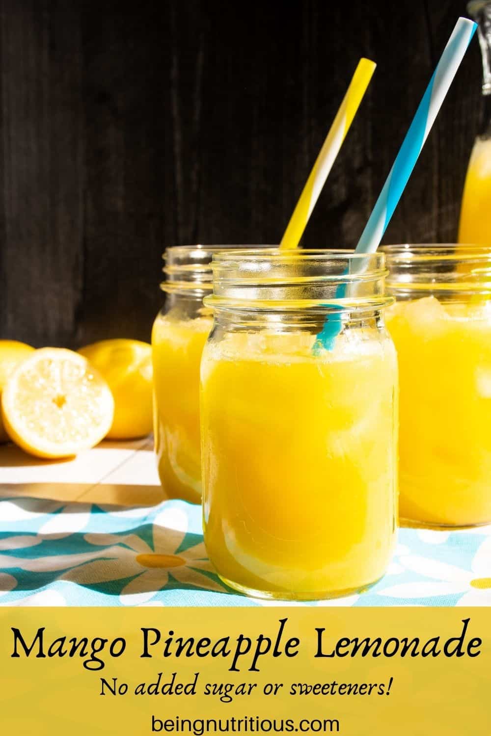 Three Mason jars with lemonade in them. Text overlay: Mango Pineapple Lemonade; No added sugar or sweeteners!