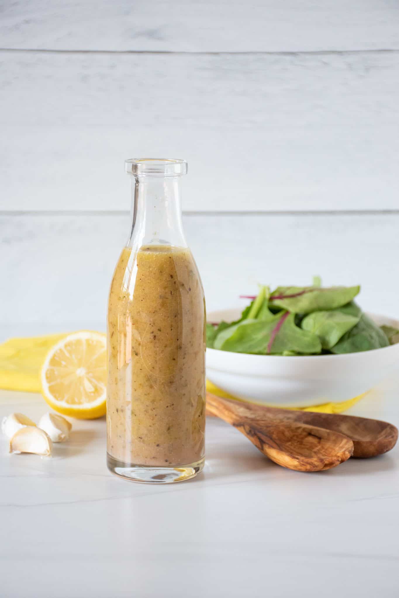 Glass bottle of salad dressing