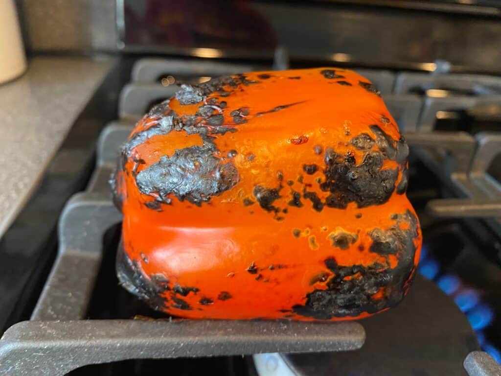 Red pepper, starting to char.