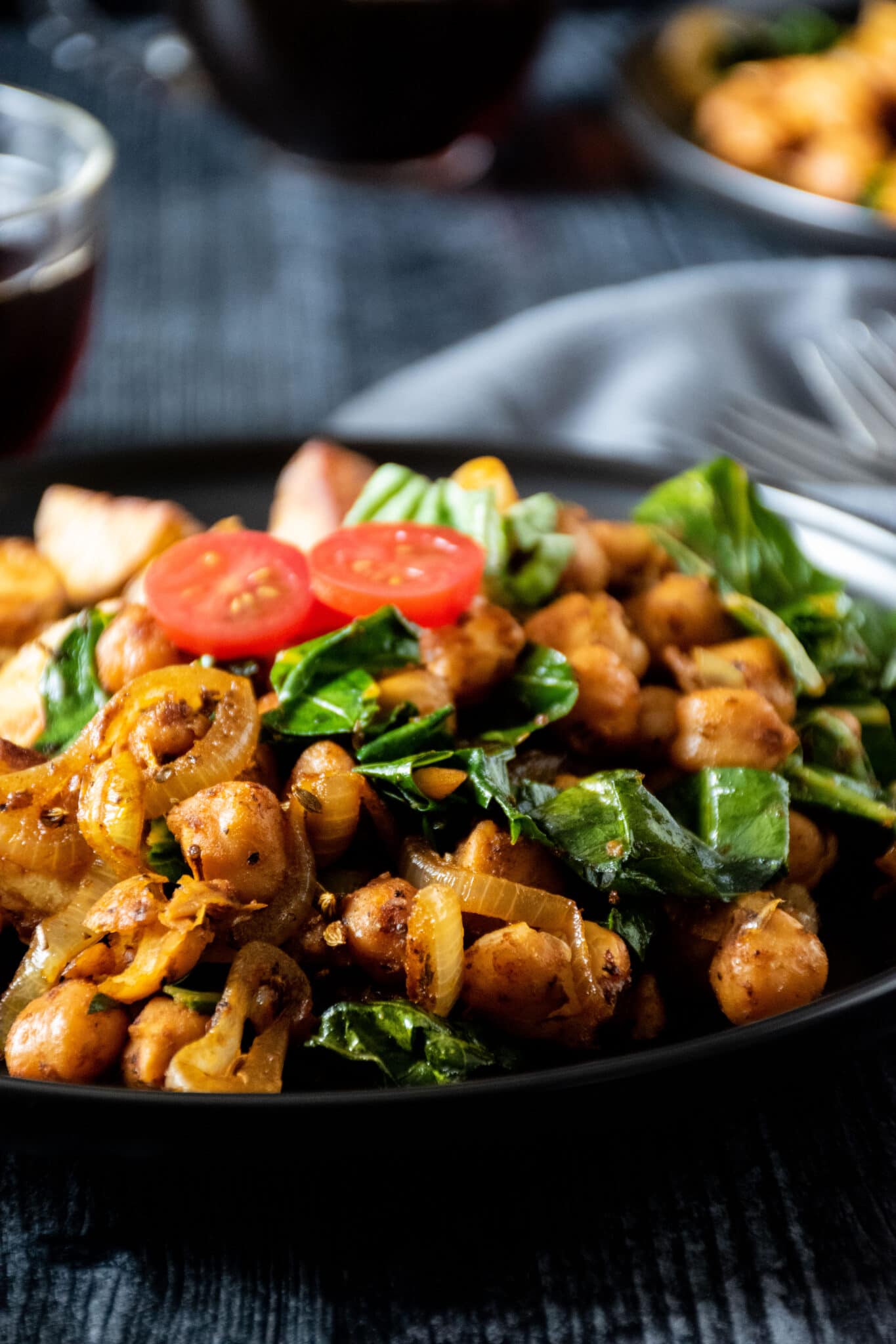 Close up of chickpea breakfast skillet on a plate.