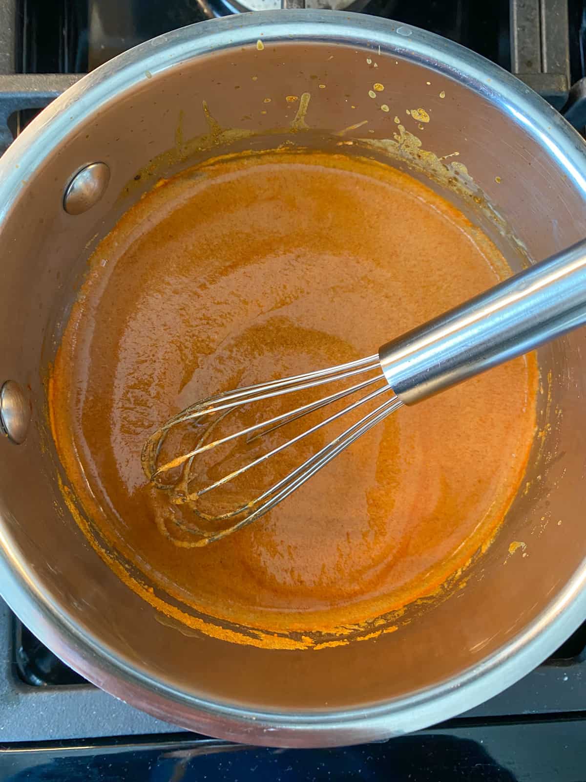 Finished sauce in a pan.