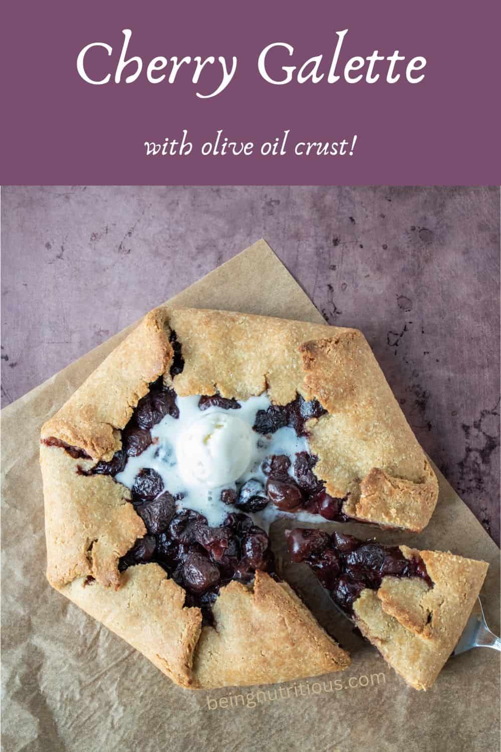 Overhead shot of cherry galette with melted ice cream on top, and a serving utensil removing a slice. Text overlay: Cherry Galette with olive oil crust.