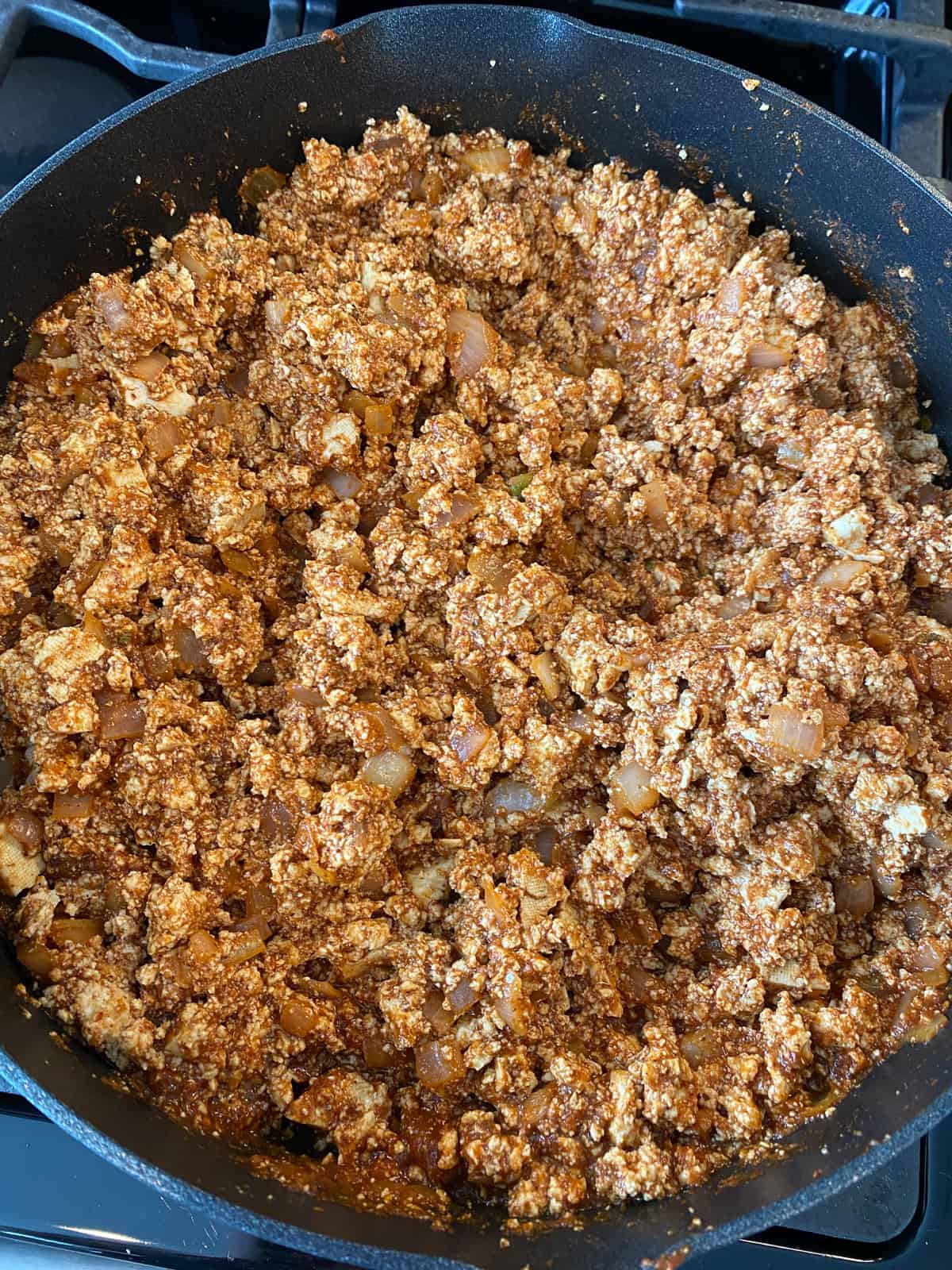 Add tofu to the skillet, stir to combine, and warm through.