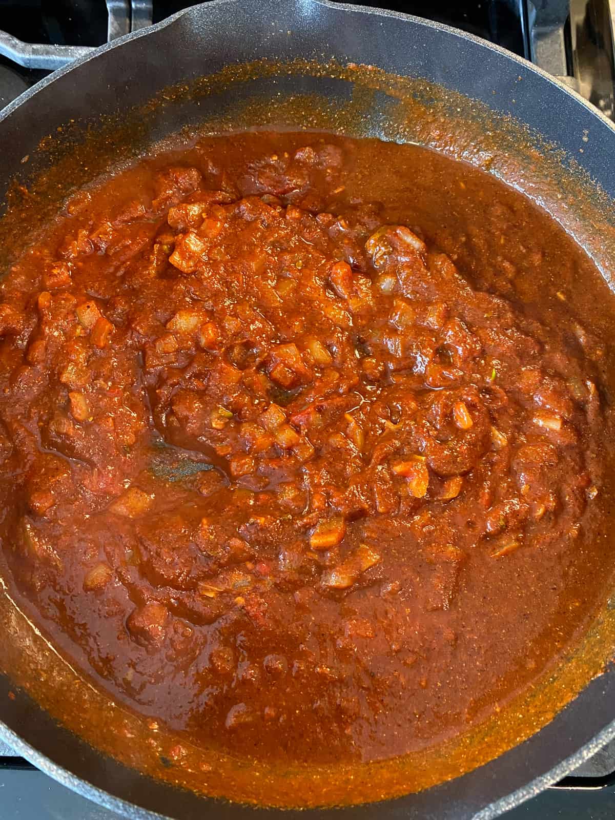 Sauce for crumbled tofu, in a skillet.