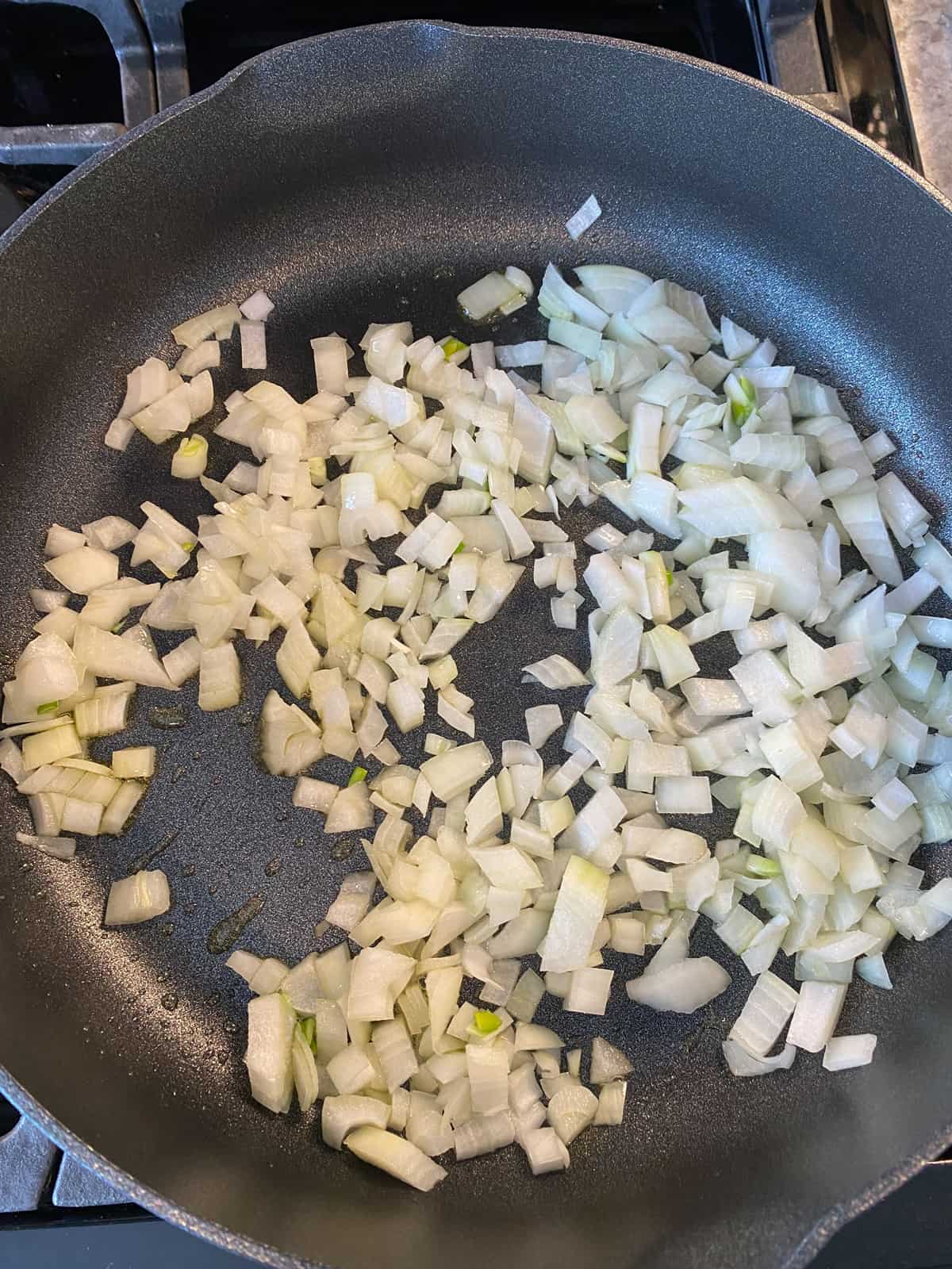 Onions sauteing in a skillet