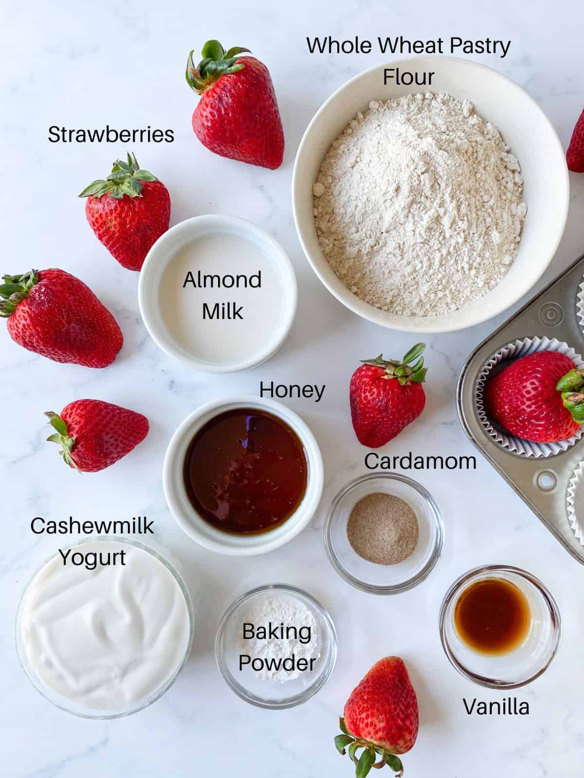 Ingredients for strawberry muffins, labeled.