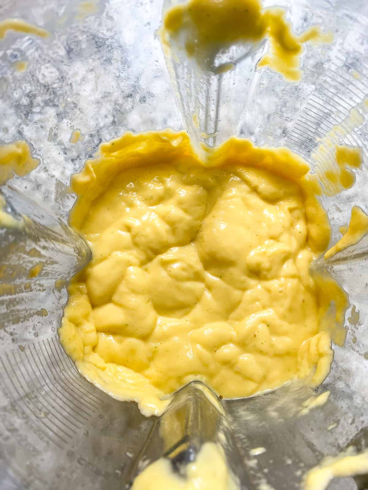 https://beingnutritious.com/wp-content/uploads/2023/06/Mango-popsicles-blended-ingredients.jpg