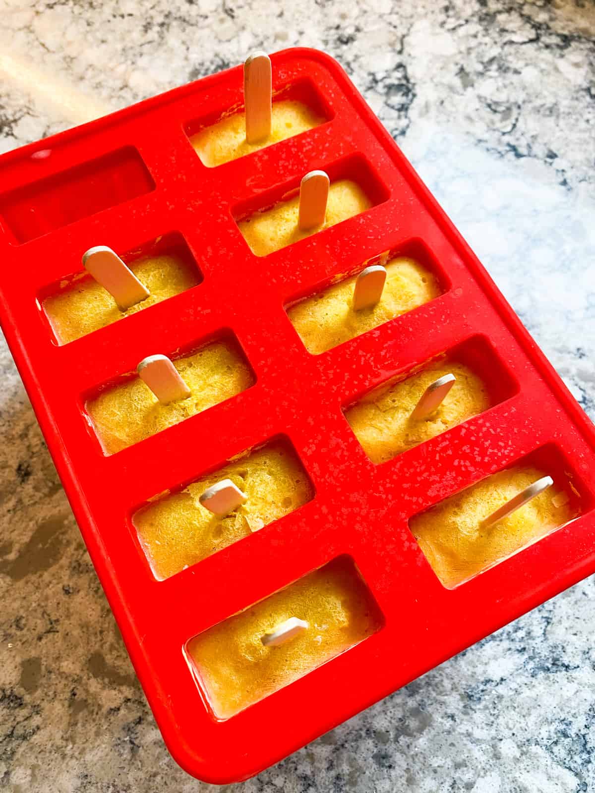 Frozen popsicles in the mold.