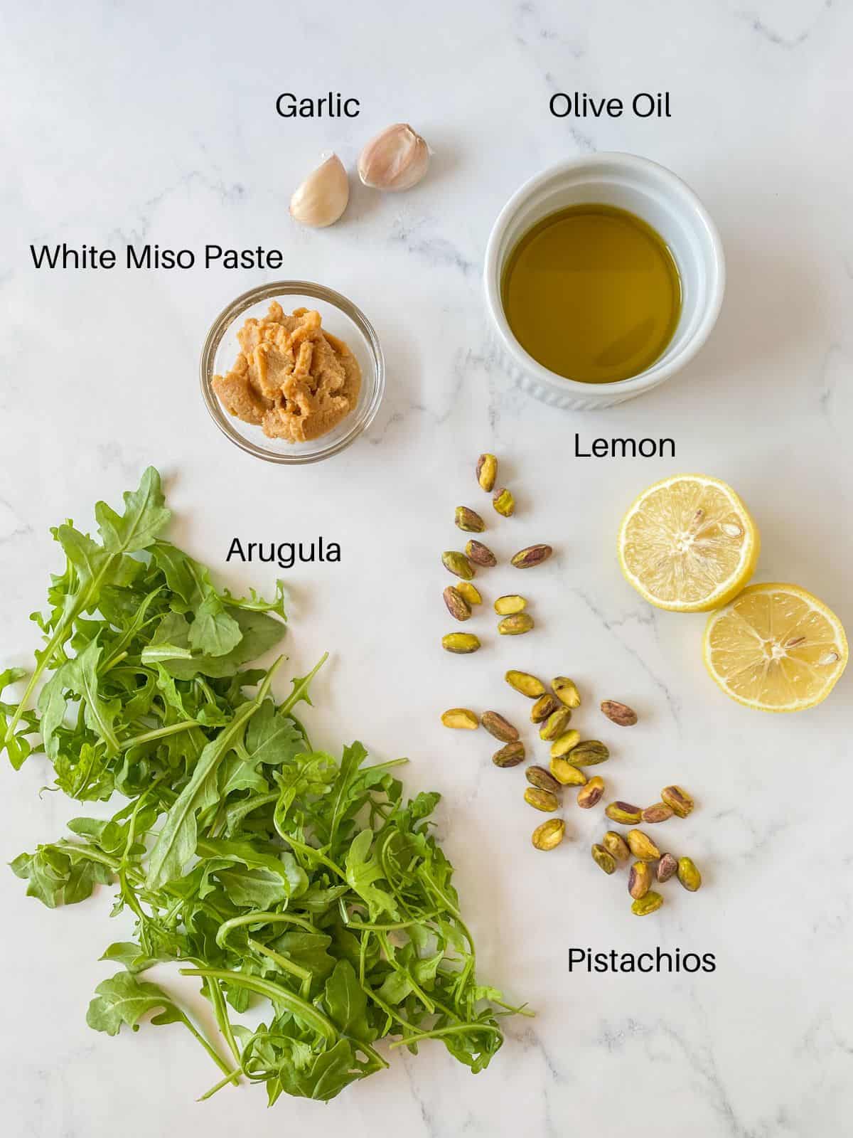 Ingredients for arugula pistachio pesto.