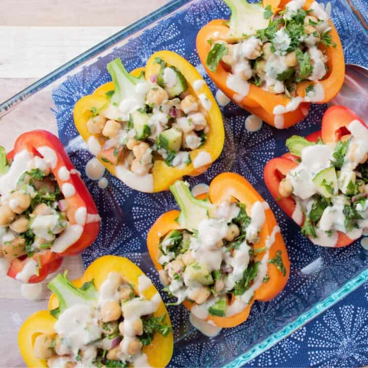 Casserole dish with stuffed peppers in it.