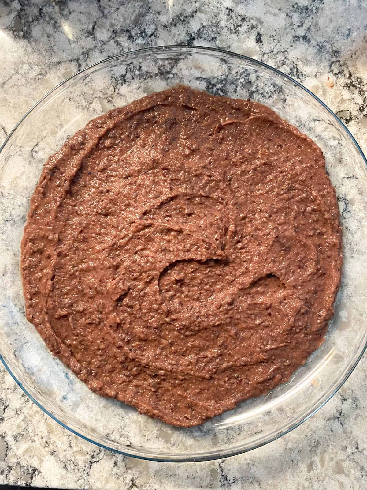 Black bean dip spread on a plate.